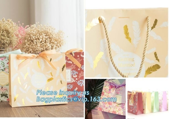 China manufacturer matt lamination christmas gift paper bag with cotton handle,New Design White Handmade Paper Bag pack